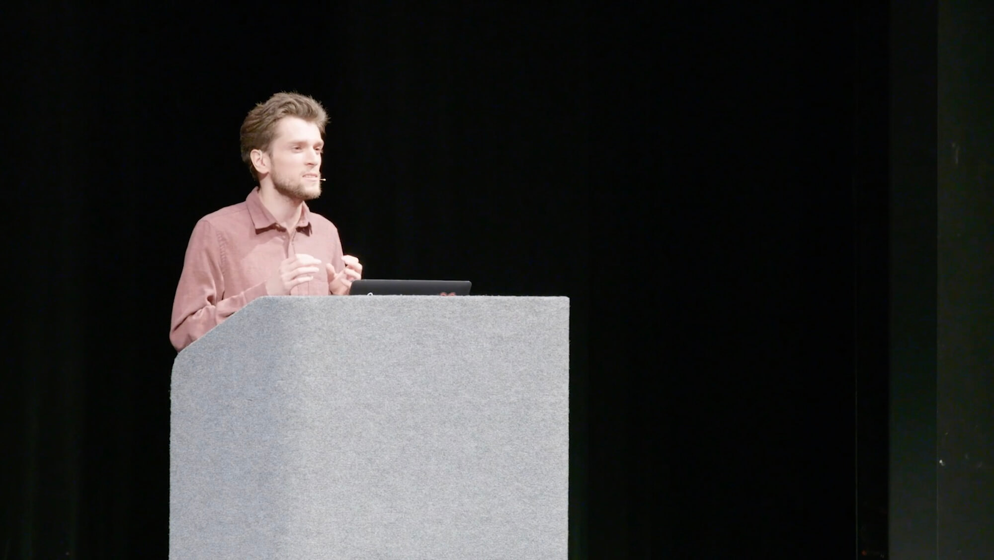 photo of Dan Abramov giving the talk 'The Wet Codebase'